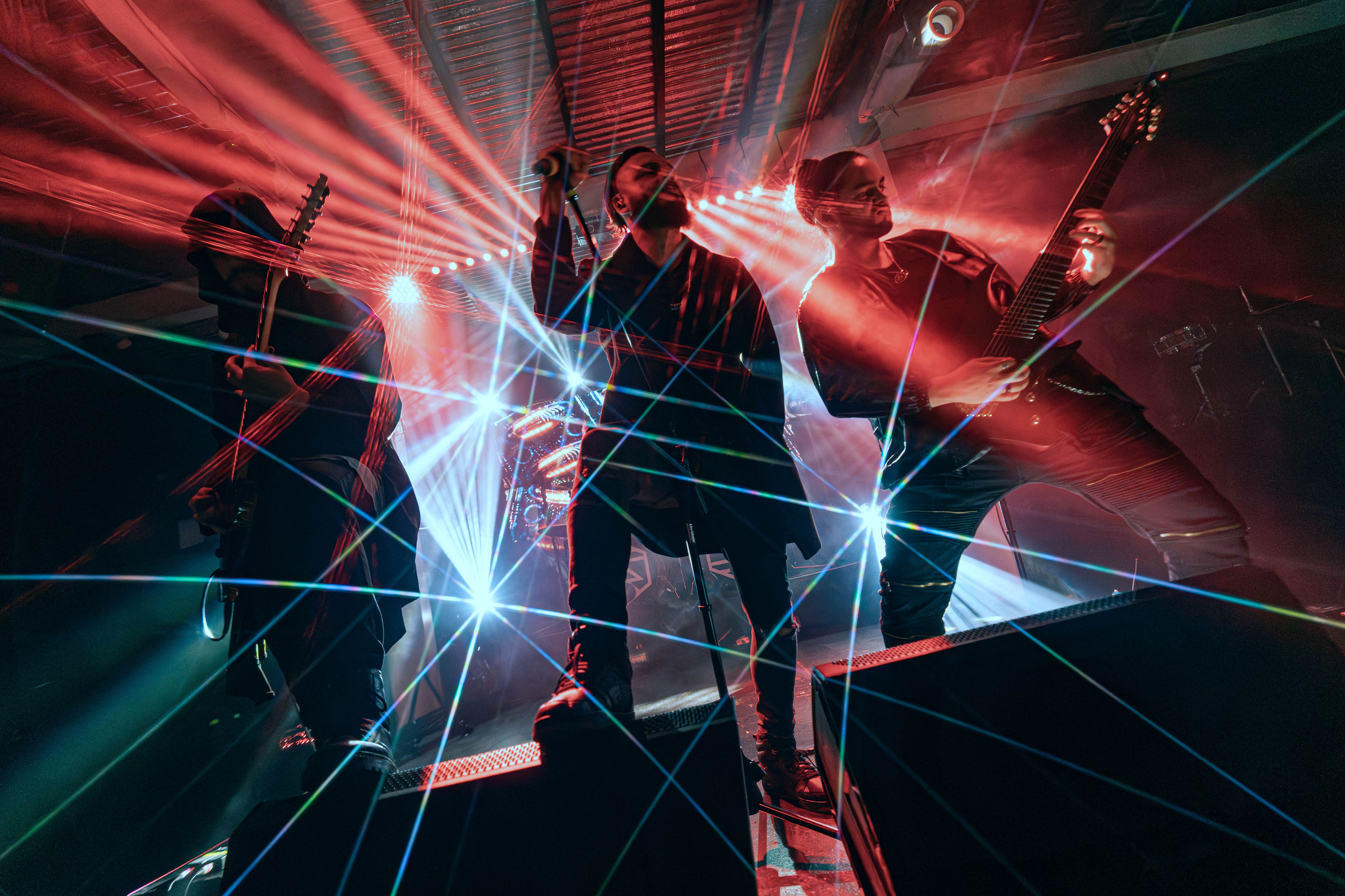 Sight of Emptiness performing live under red and blue stage lights